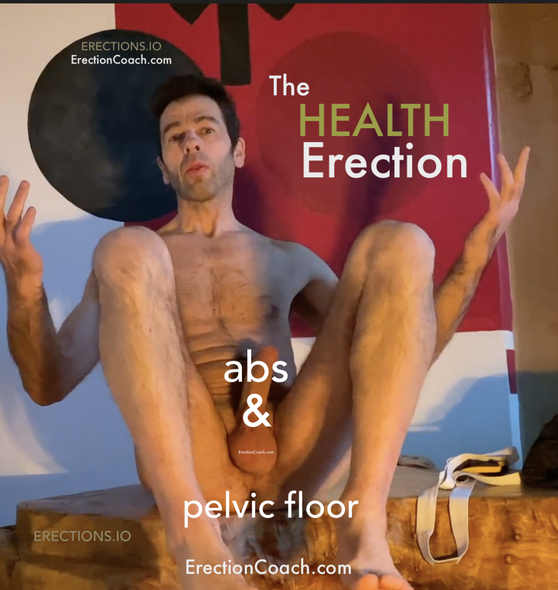 naked man sitting on wood block raising his bent legs either side of erect penis that points upwards and testicles shown below with some text over penis 